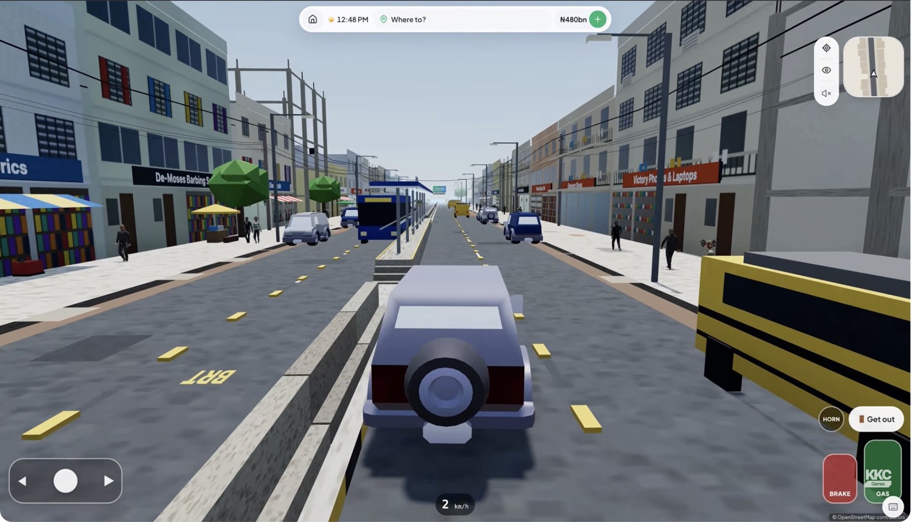 KKC Games drives a LagosLife car beside the marked BRT lane and buses