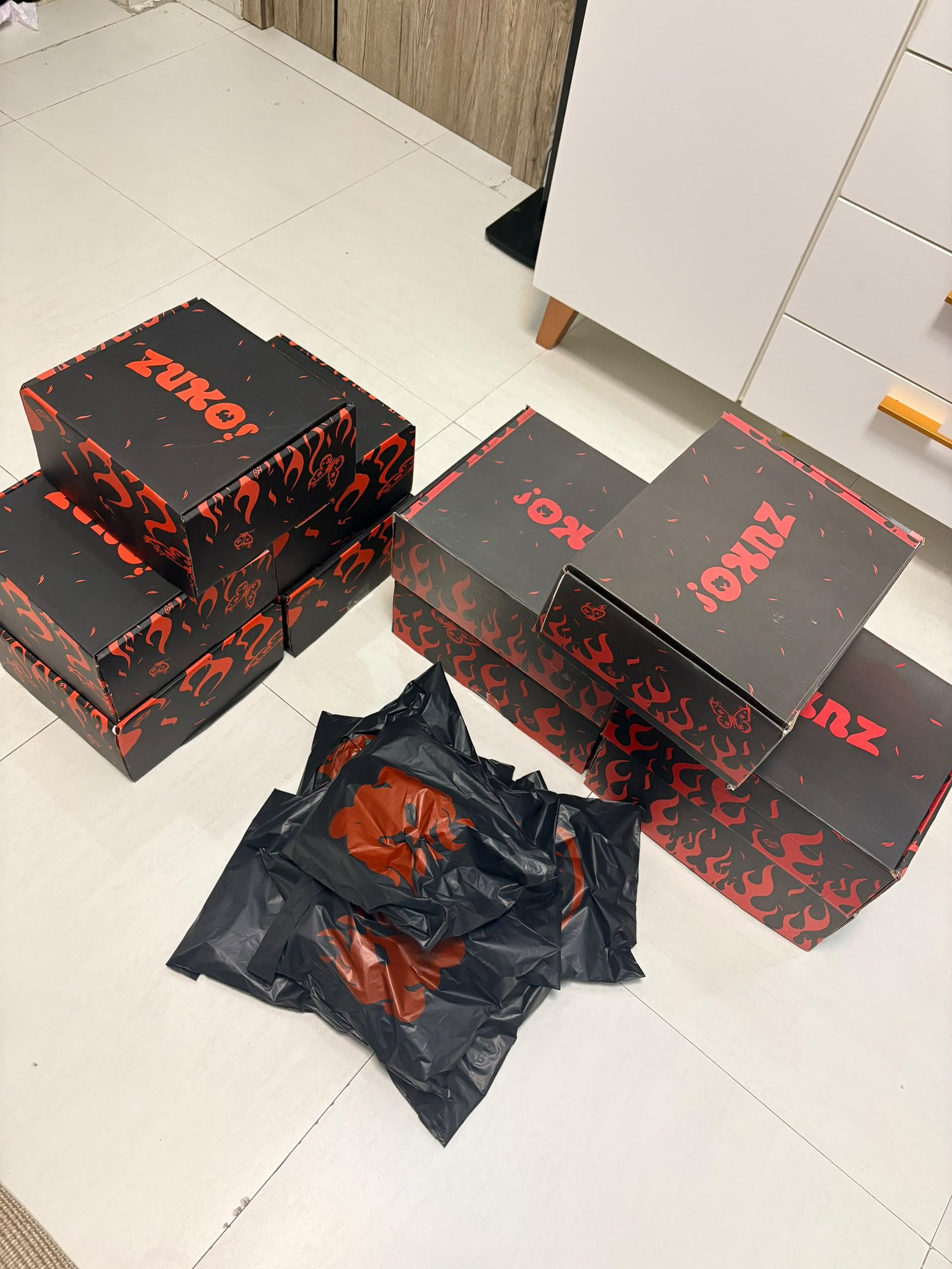 Black and red ZUKO boxes and packs shown in the official LagosLife prize-hunt announcement